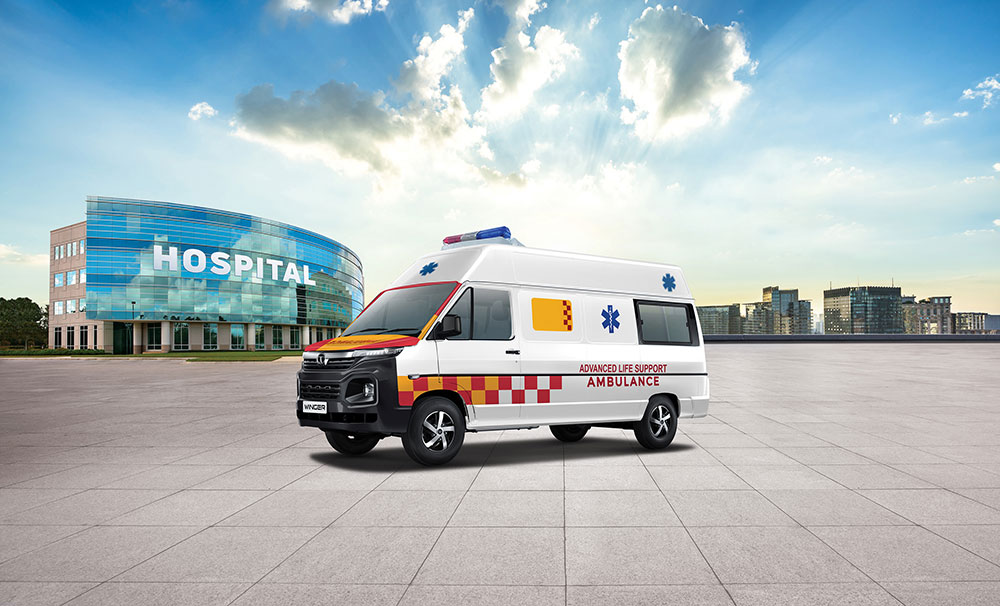 Ambulance on road with medical team